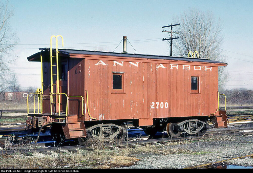 We’ll close out with Ann Arbor #2700 at Toledo, OH, 1973.  It’s simple and plain, and yet still unique for a caboose.  And, it solves the issue of deciding which direction the cupola should go!